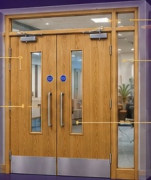 Oak double fire doorset with side panel and fanlight